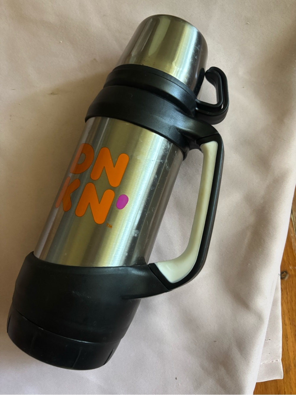 Dunkin Stainless Steel Travel Thermos with Orange Logo and Black Handle